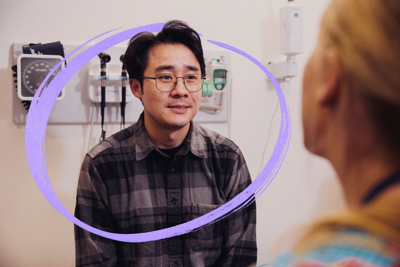 A man is talking to a nurse