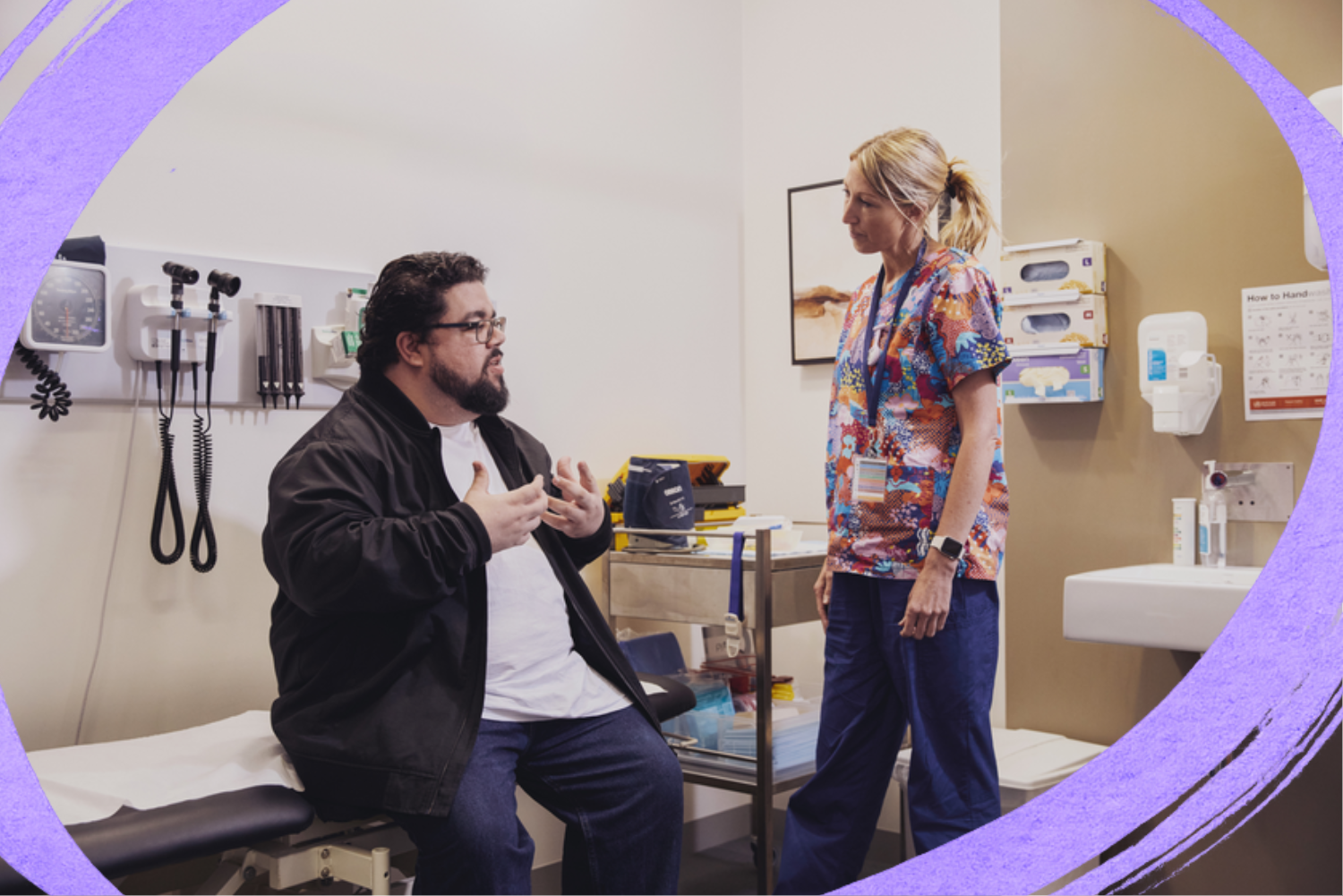 A nurse in conversation with a male patient